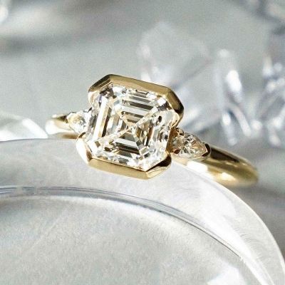 1.5 Carat Asscher Cut Clutch Three Stone Diamond Engagement Ring