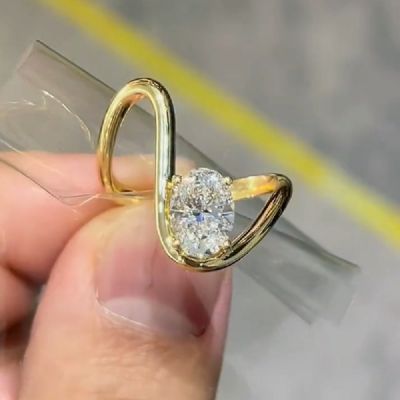 18KT Yellow Gold With 2.0 CT Diamond Oval Cut Engagement Stone Wave Ring