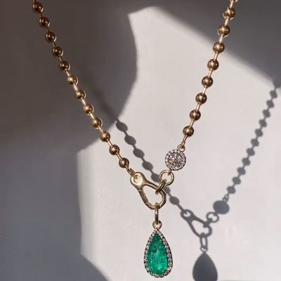 6ct Pear Cur Emerald & 1.5ct Round Cut White Sapphire Halo Moi et Toi Necklace in Yellow Gold