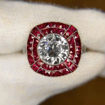 2.04ct Round Cut White Sapphire and 1.85ct Double Ruby Halo Engagement Ring
