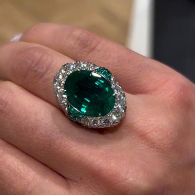7.6ct Oval Cut Emerald Set Within Round Cut White Sapphires And Emeralds Art Design Ring