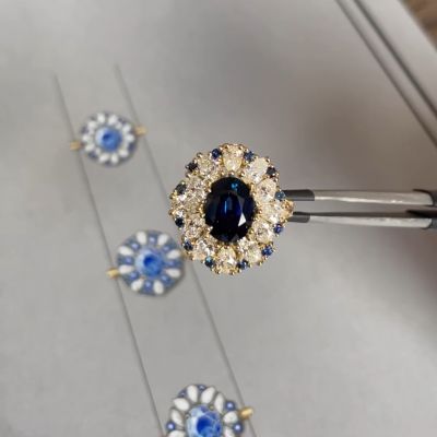 2.5ct Oval Cut Blue Lab-Grown Gemstone with 12 Pear Shaped Side Stones Surround Design Sterling Silver Plated Engagement Rings