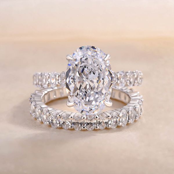 Stunning Oval Cut Simulated Diamond Wedding Set In White Gold