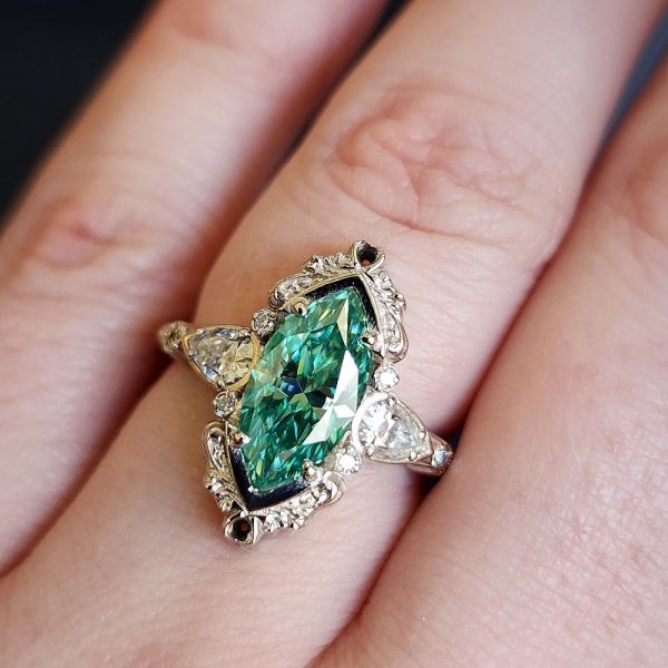 1.8 Carat Green Marquise Engagement Ring with Pear Side Stones And Gold Scrollwork