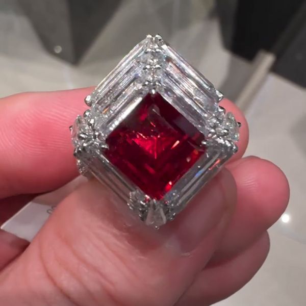 2.95ct Asscher Cut Ruby Accompanied By 6.2ct Mixed Cut White Sapphires Handmade Ring