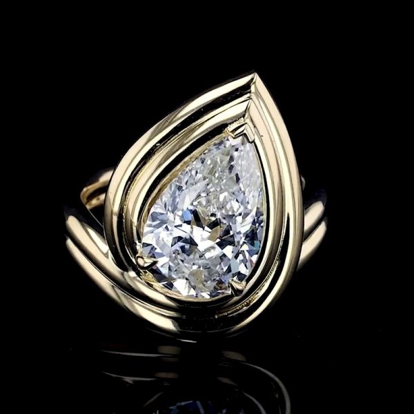 4.07ct Pear Cut White Sapphire Free-flowing Yellow Gold Ring